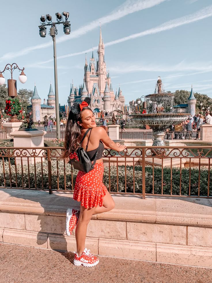 This contains: Christmas at Disney photo inspo