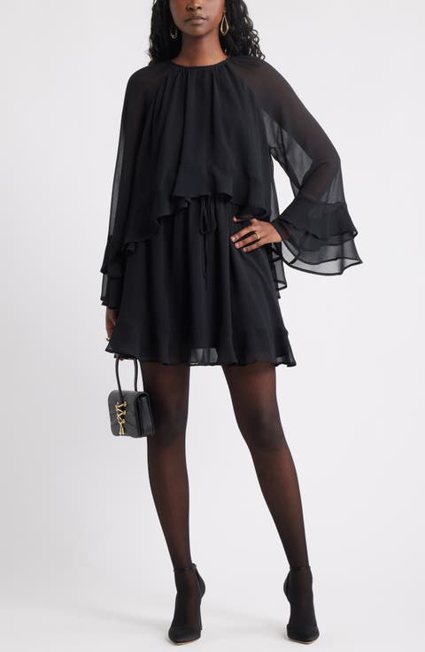 Romantic Flair: Ruffled Dress Paired with Classic Black Tights