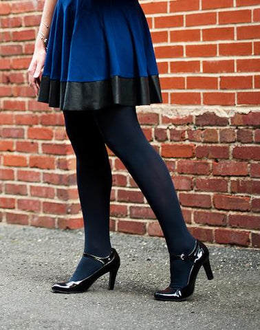 Bold Contrast: Bright Colored Dress with Classic Black Tights