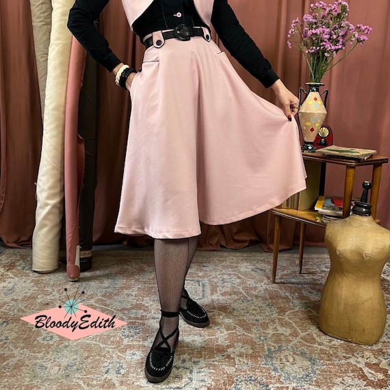 Vintage Flair: Fishnets with Pleated Skirts and Ballet Flats