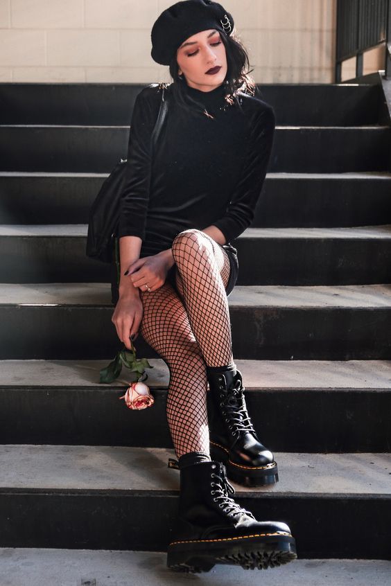 Effortlessly Edgy: Fishnets with Chunky Combat Boots