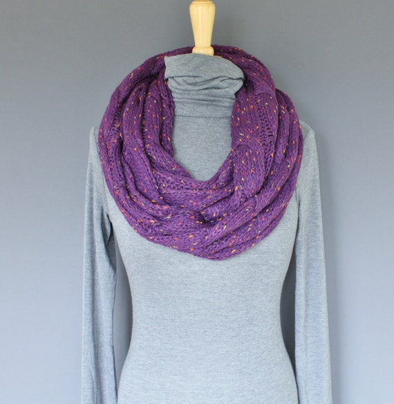 Cozy and Cute: Chunky Knit Scarf with Varsity Jacket Layers