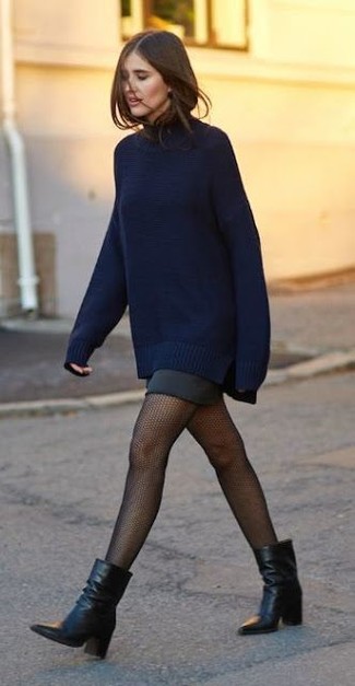 Street Style Star: Oversized Sweater and Fishnet Layers