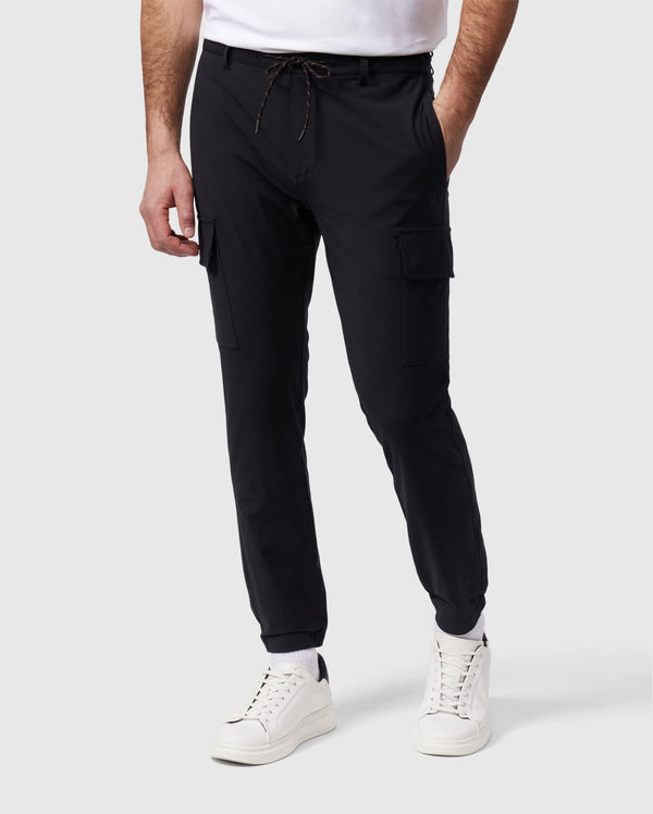 Sporty Edge: Black Shirt with Joggers and Dad Sneakers