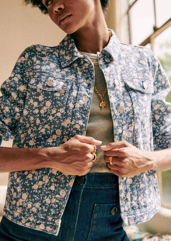 Vintage-Inspired Denim Jacket Over Floral Dress