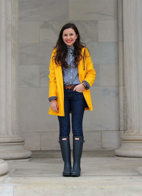 Vibrant Yellow Raincoat Paired with Striped Rain Boots