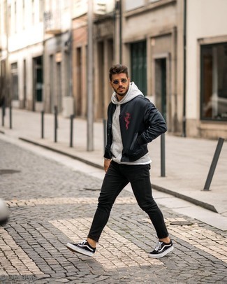 Casual Layers: Hoodie Under a Varsity Jacket