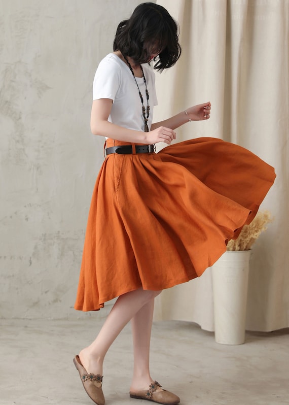 Rust-Colored Wrap Skirt with Flowing Silhouette